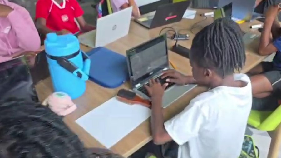 Student working on a laptop during Creator Course